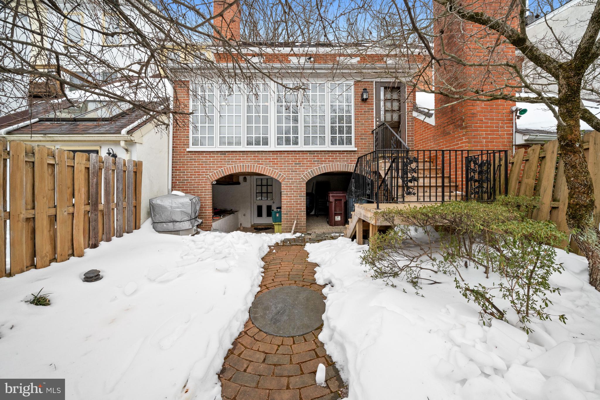 55 Ivy Road Wilmington, DE 19806 - Photo 34 of 38 a view of a house with a yard covered in snow