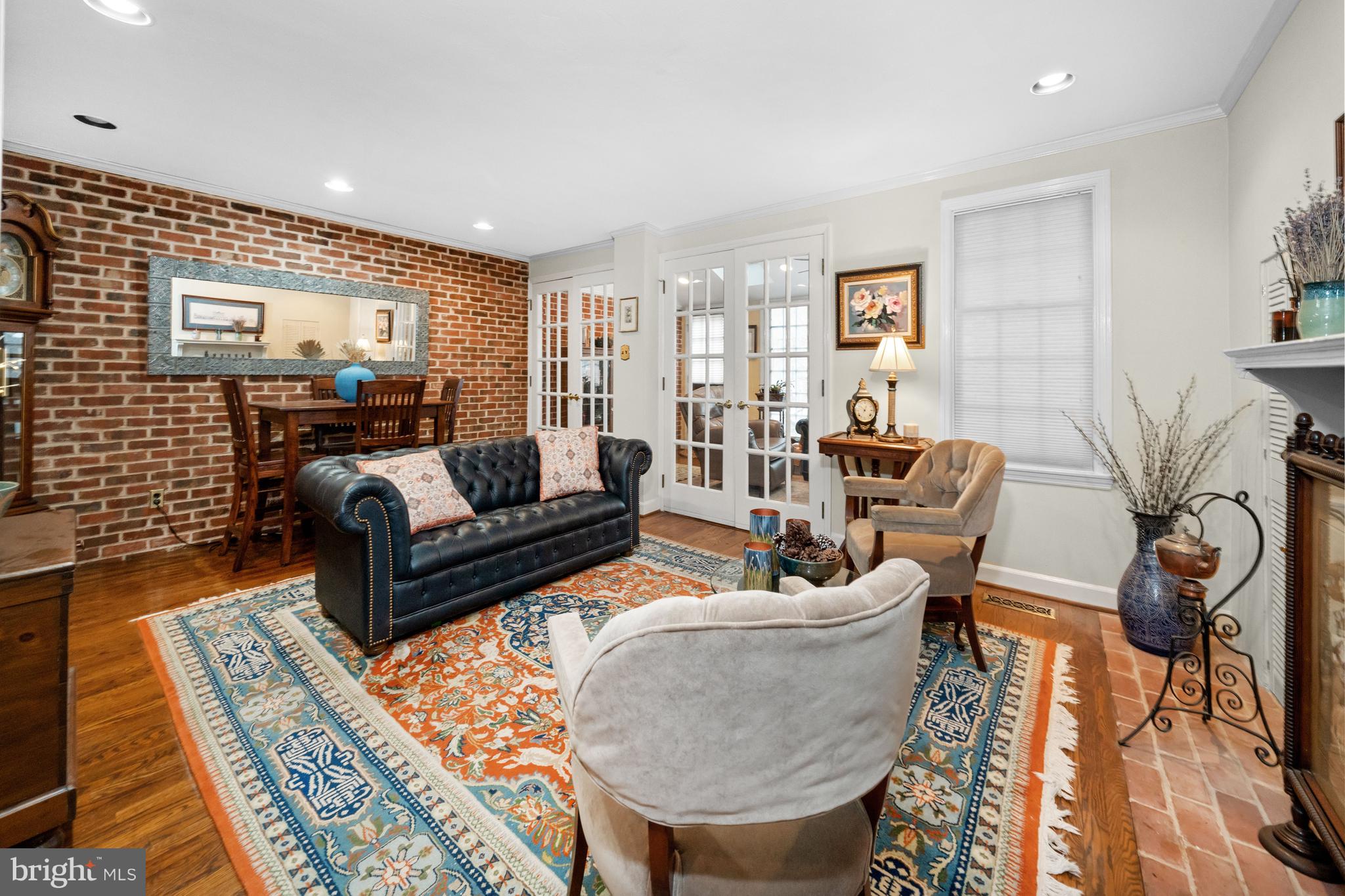 55 Ivy Road Wilmington, DE 19806 - Photo 5 of 38 a living room with furniture and a rug