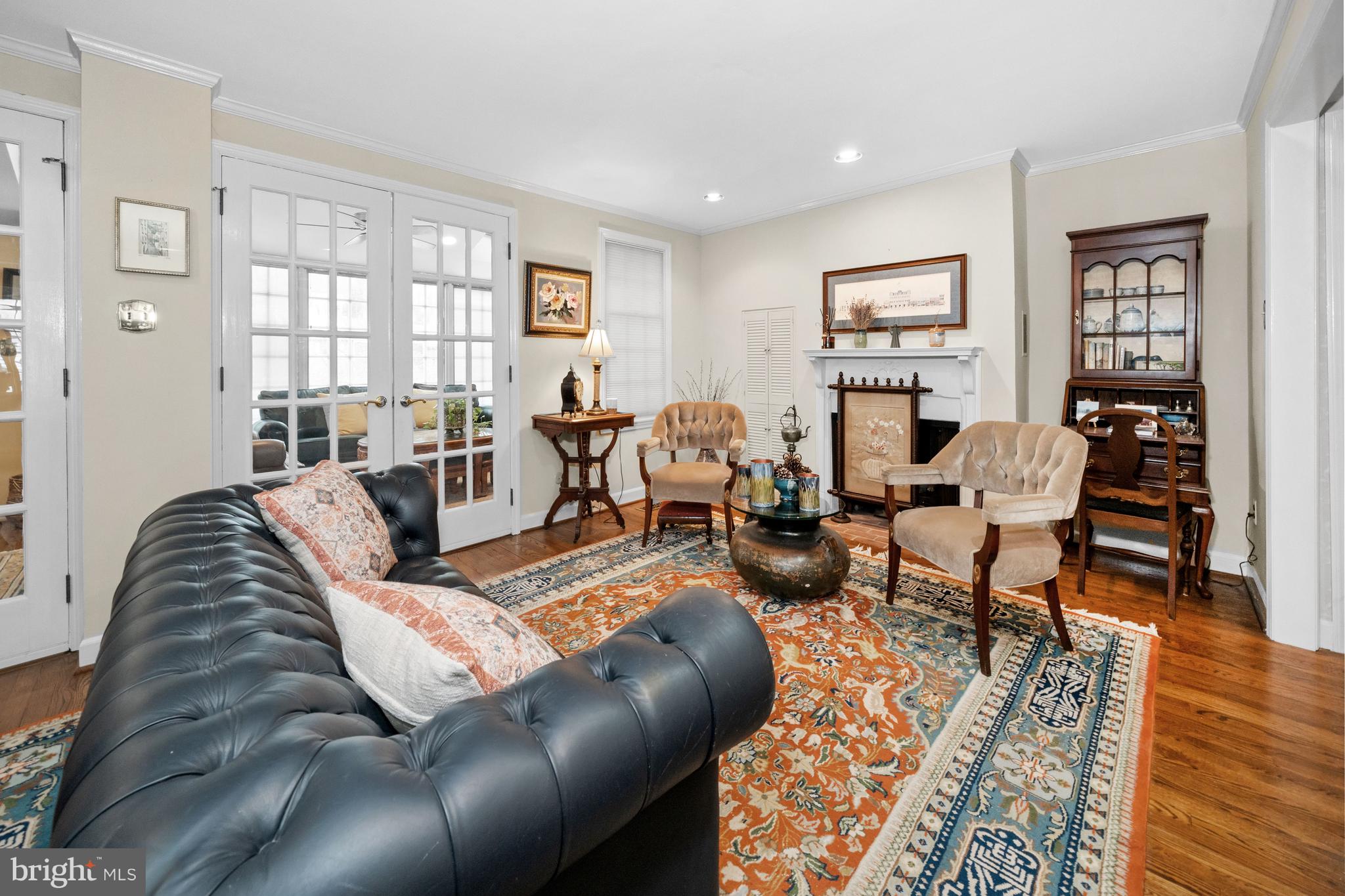 55 Ivy Road Wilmington, DE 19806 - Photo 6 of 38 a living room with furniture or couch and a wooden floor