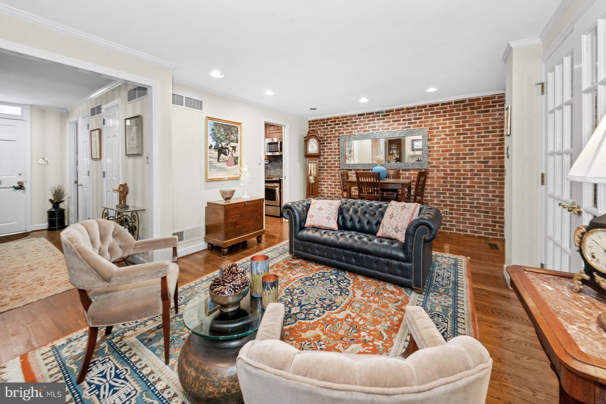 55 Ivy Road Wilmington, DE 19806 - Photo 7 of 38 a living room with furniture and a fireplace