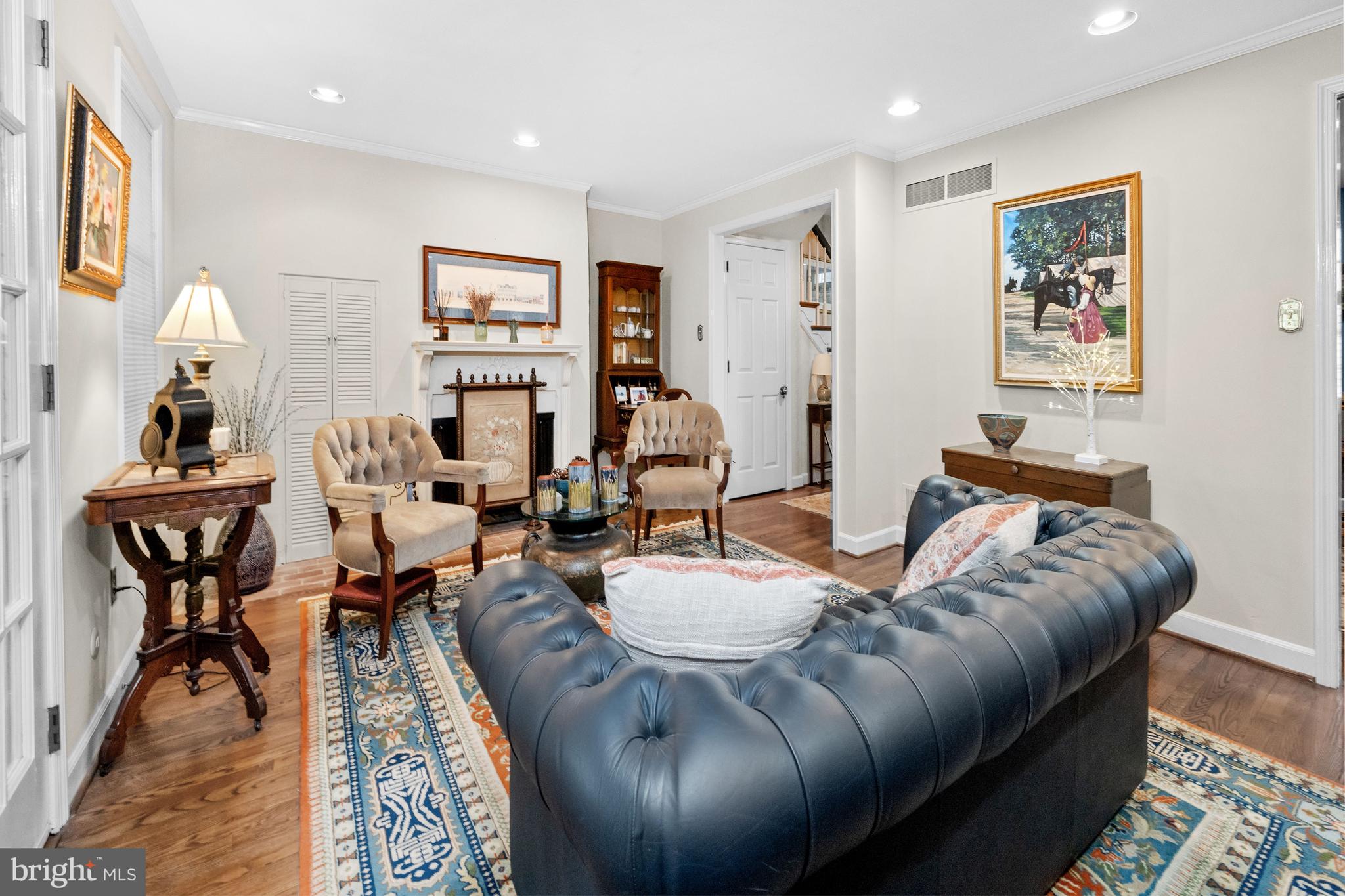 55 Ivy Road Wilmington, DE 19806 - Photo 8 of 38 a living room with furniture and wooden floor