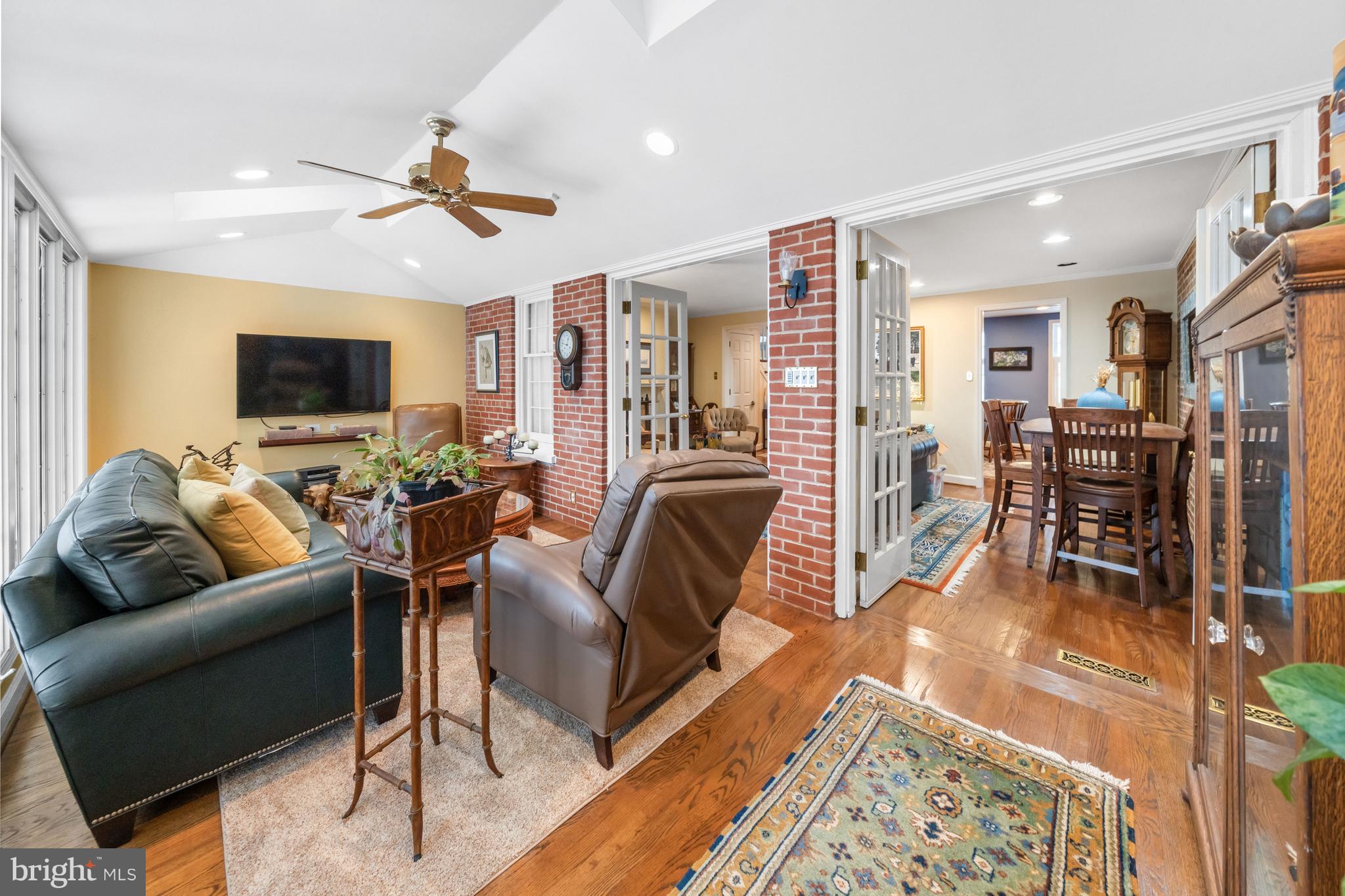55 Ivy Road Wilmington, DE 19806 - Photo 10 of 38 a living room with furniture and a flat screen tv