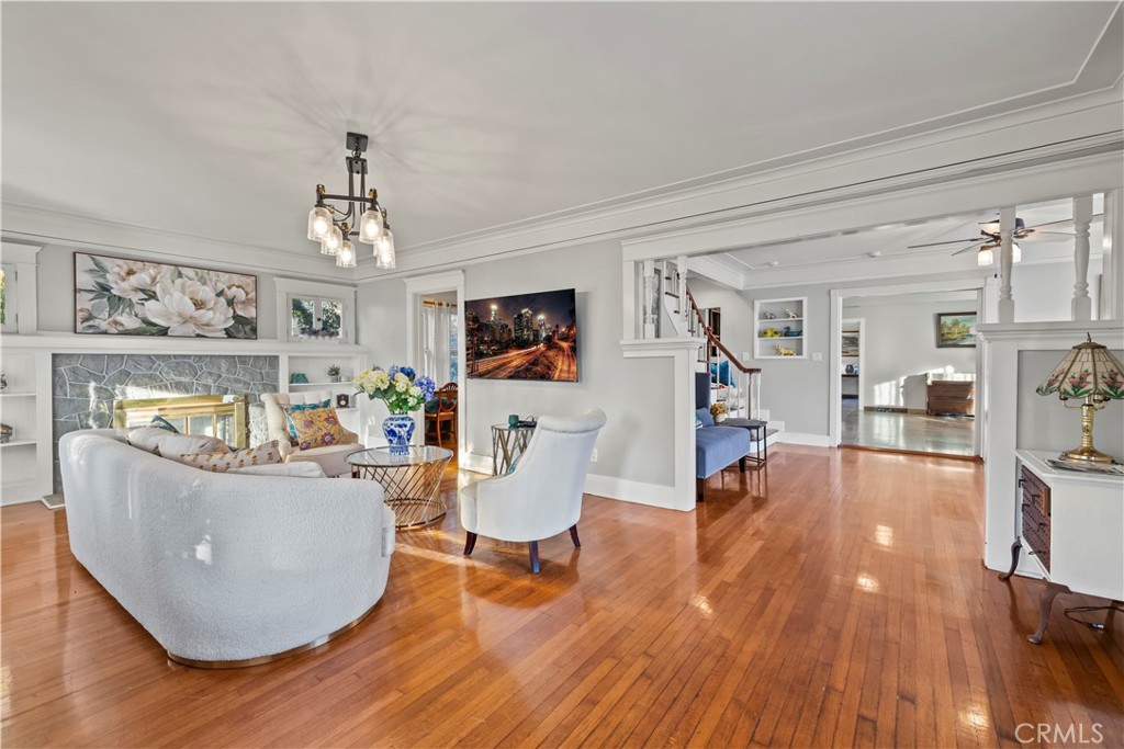 790 North El Molino Avenue Pasadena, CA 91104 - Photo 11 of 34 a living room with furniture and a wooden floor