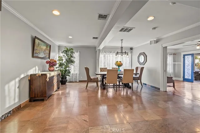 a bedroom with bed and a table