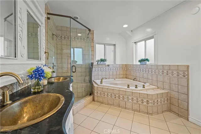 a bathroom with a sink toilet and a mirror