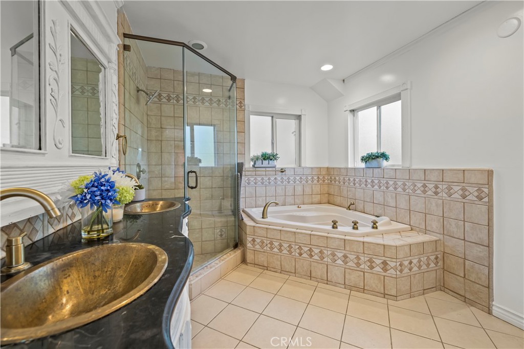 790 North El Molino Avenue Pasadena, CA 91104 - Photo 21 of 34 a bathroom with a tub sink and mirror