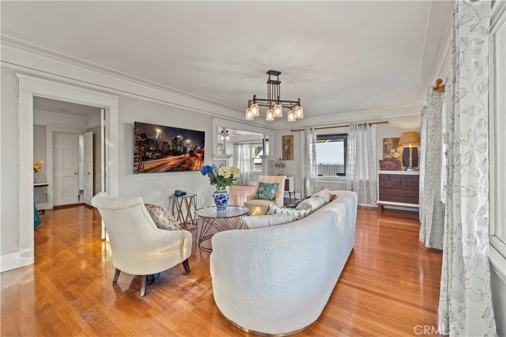 790 North El Molino Avenue Pasadena, CA 91104 - Photo 10 of 34 a living room with fireplace furniture and a wooden floor