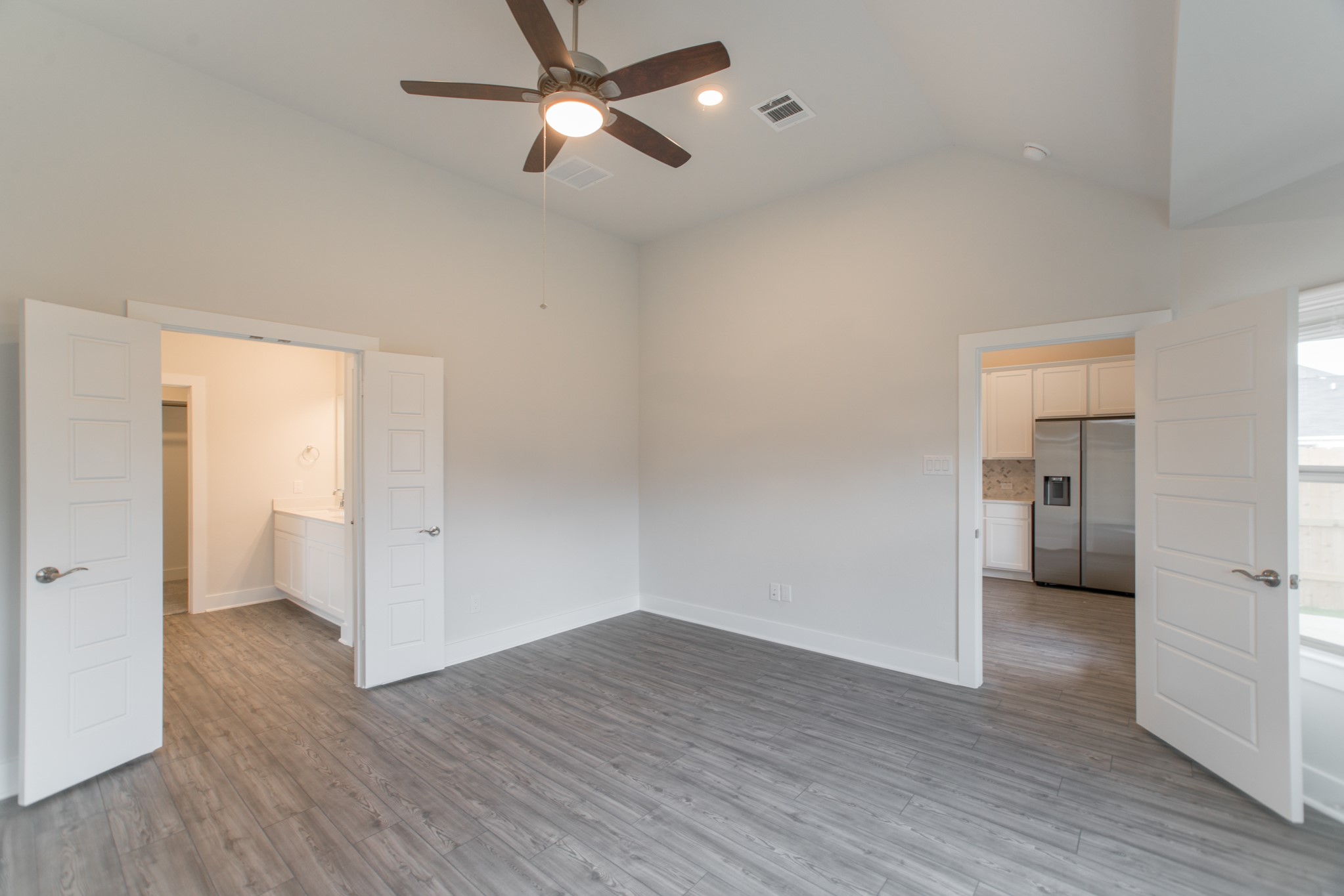 10539 Preserve Way Conroe, TX 77385 - Photo 14 of 31 a view of empty room with wooden floor