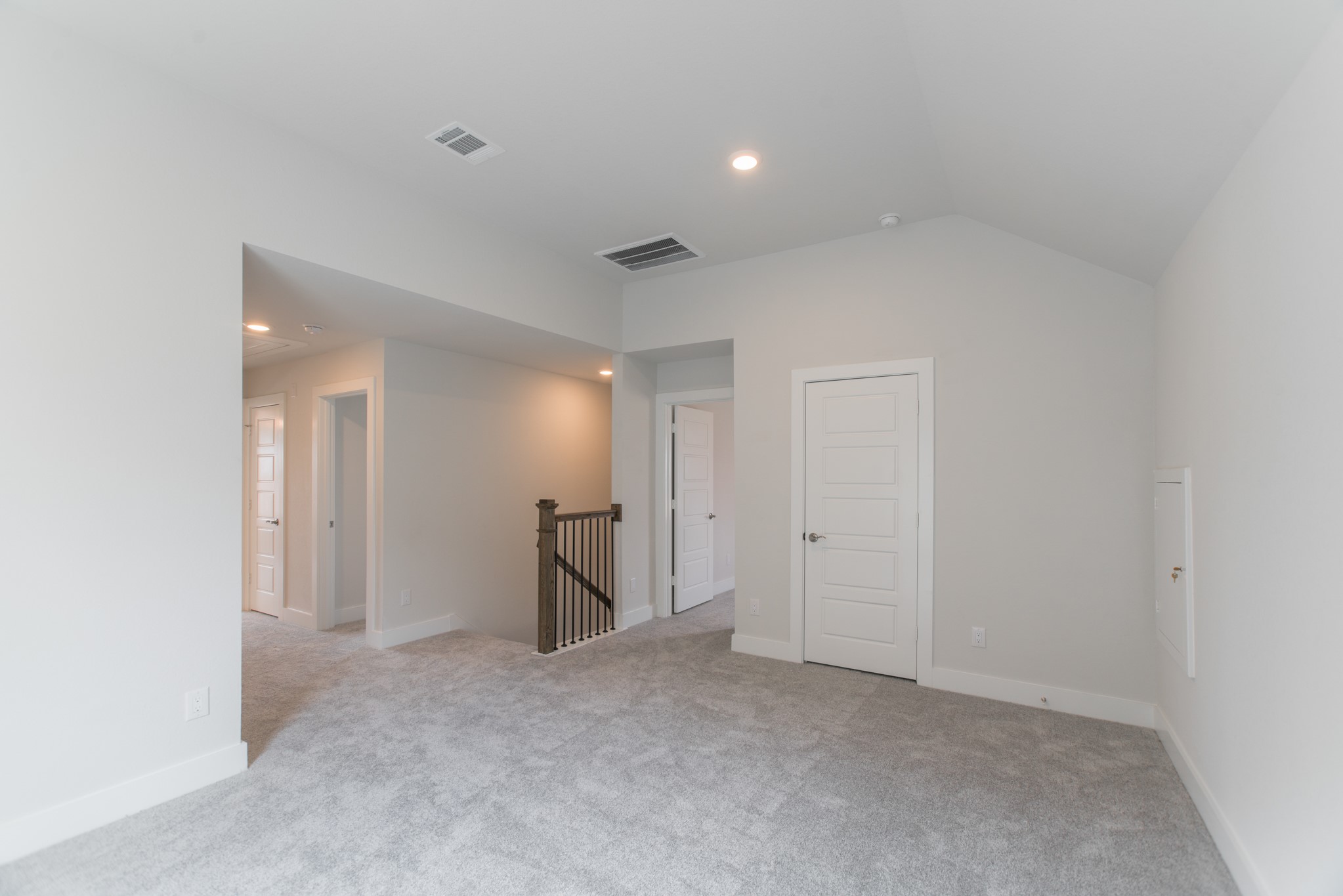 10539 Preserve Way Conroe, TX 77385 - Photo 22 of 31 a view of a livingroom and a kitchen
