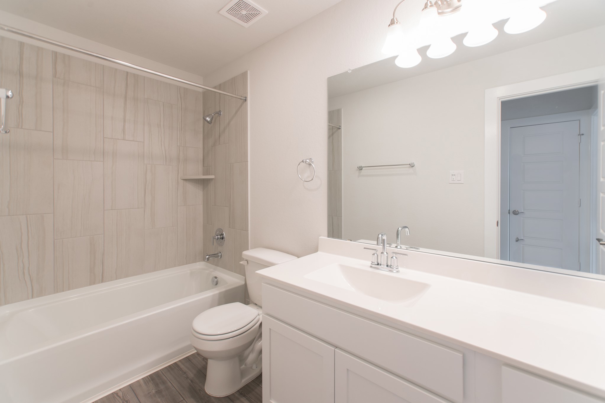 10539 Preserve Way Conroe, TX 77385 - Photo 27 of 31 a bathroom with a sink a toilet and shower