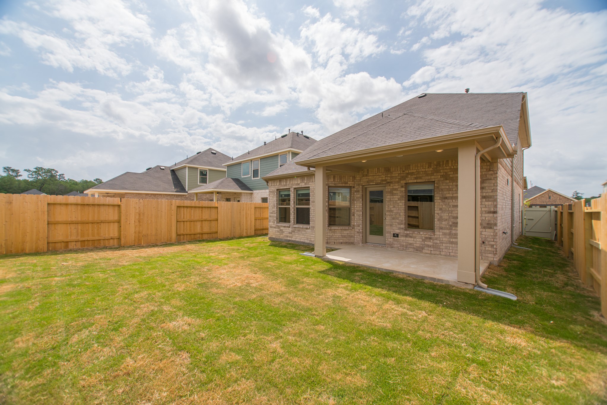10539 Preserve Way Conroe, TX 77385 - Photo 28 of 31 a view of a house with basketball court