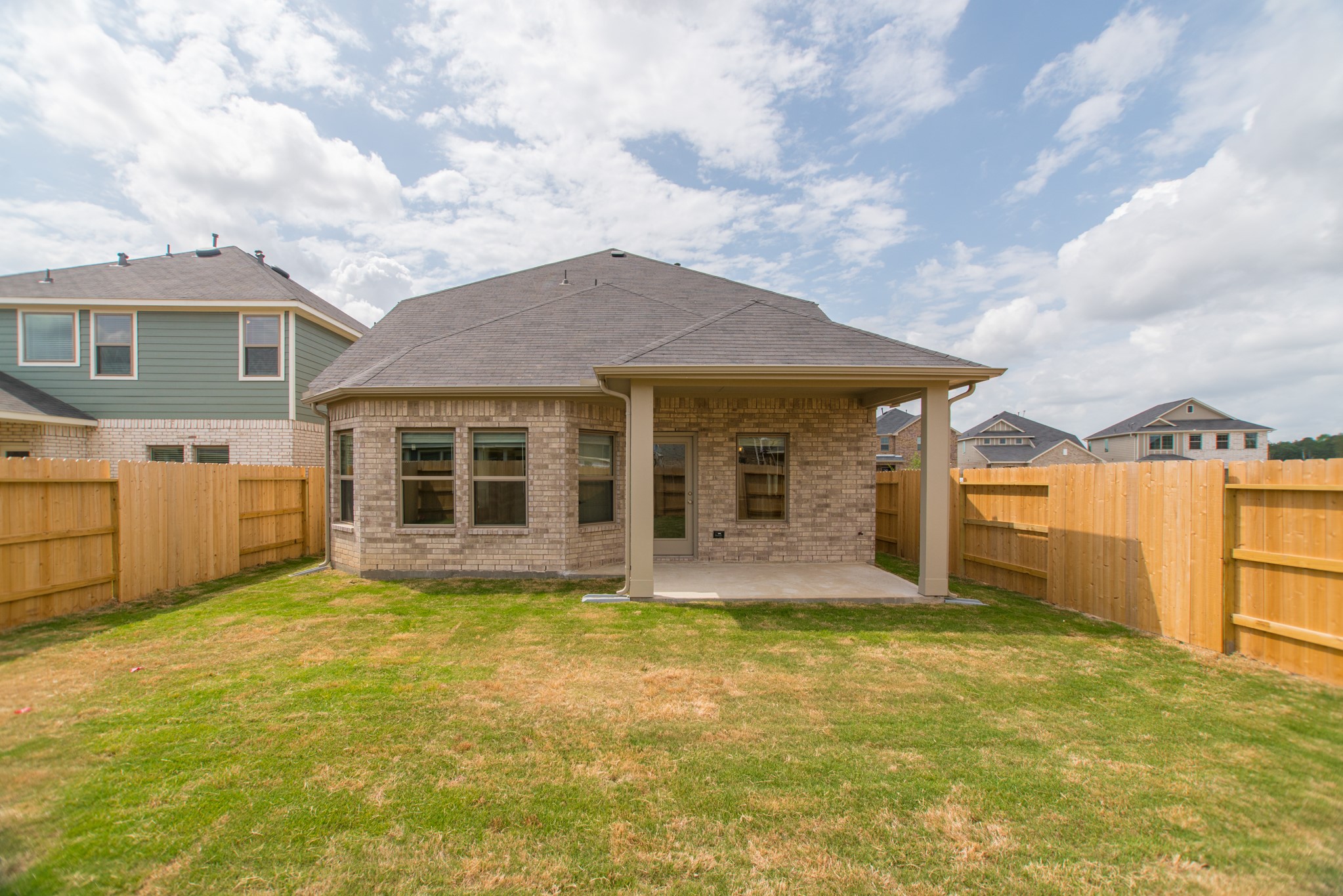 10539 Preserve Way Conroe, TX 77385 - Photo 29 of 31 a view of a house with pool and sitting area