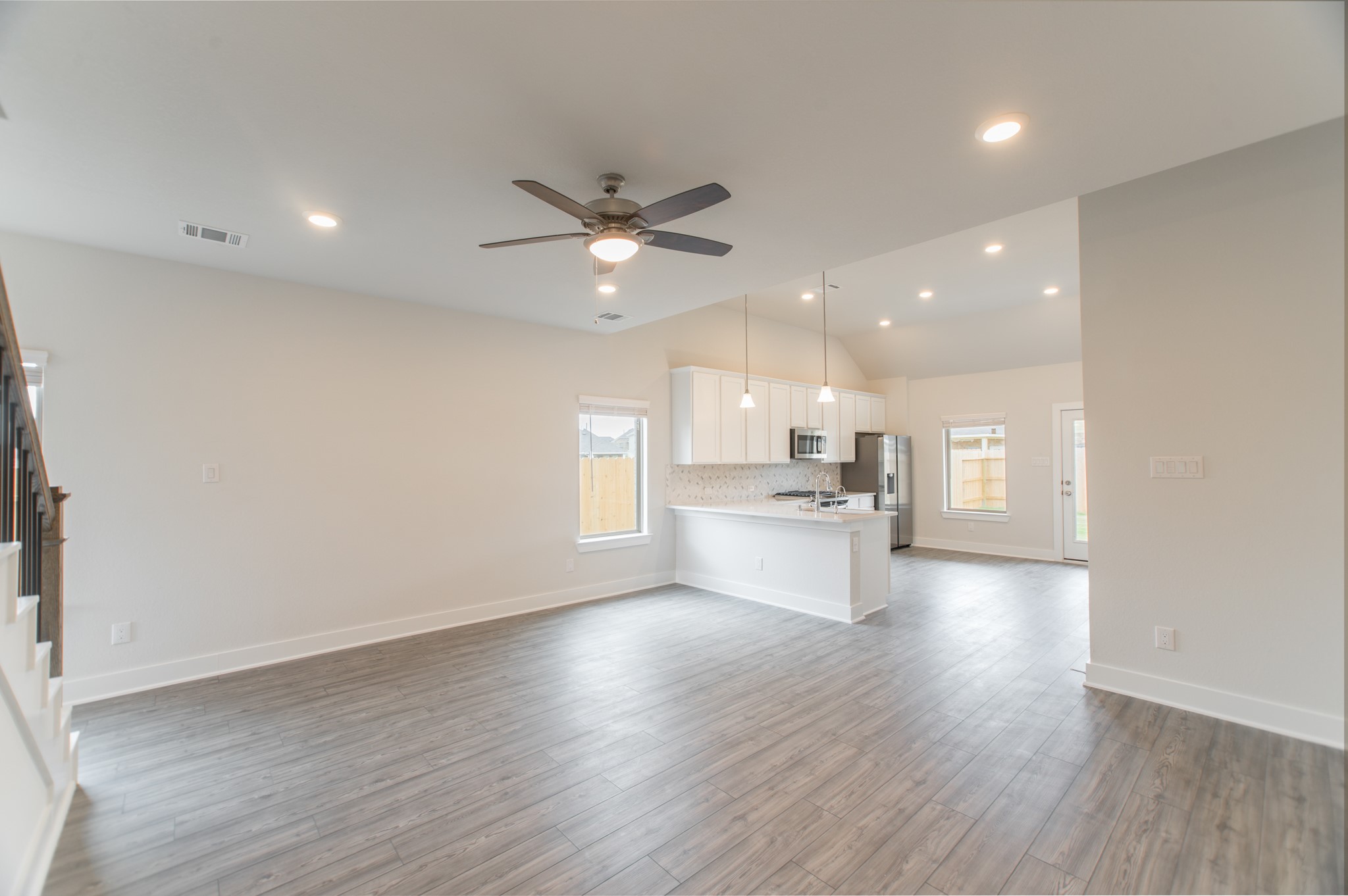 10539 Preserve Way Conroe, TX 77385 - Photo 7 of 31 a view of kitchen with sink and wooden floor