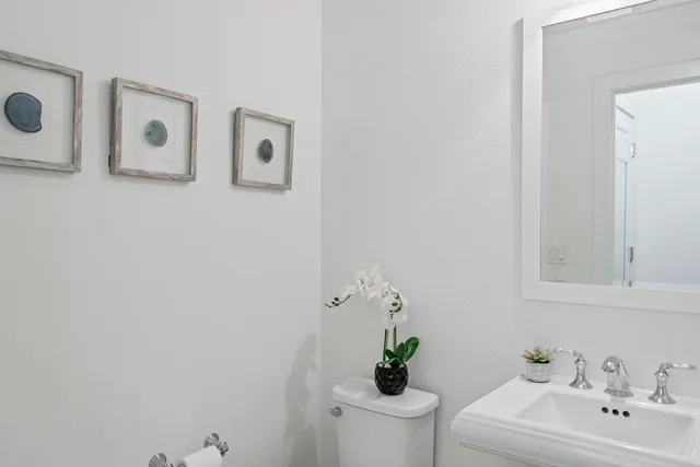 a bathroom with a sink and mirror