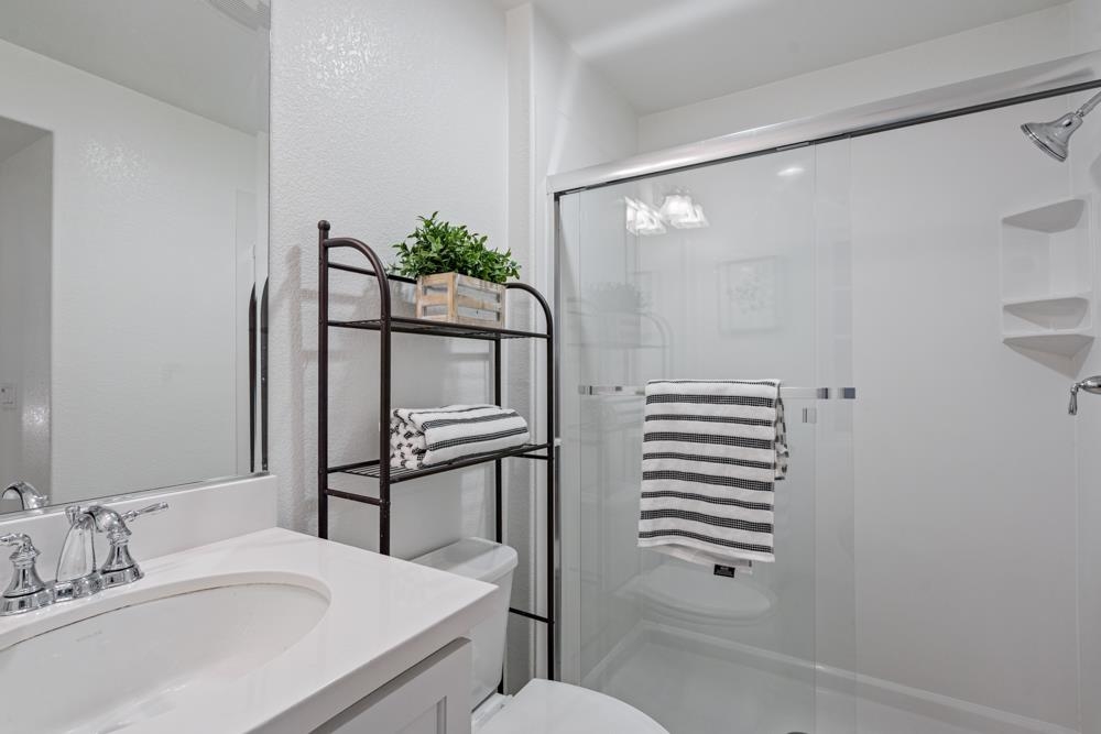 47236 Cavanaugh Common Fremont, CA 94539 - Photo 22 of 52 a bathroom with a sink and mirror