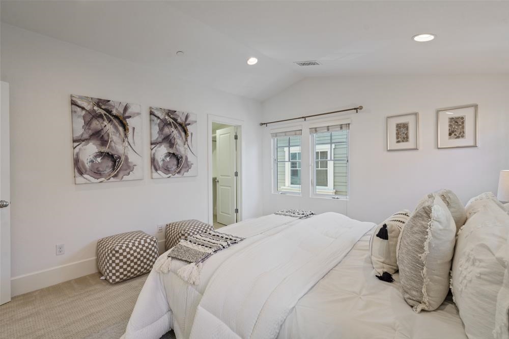 47236 Cavanaugh Common Fremont, CA 94539 - Photo 29 of 52 a bedroom with a bed and a window