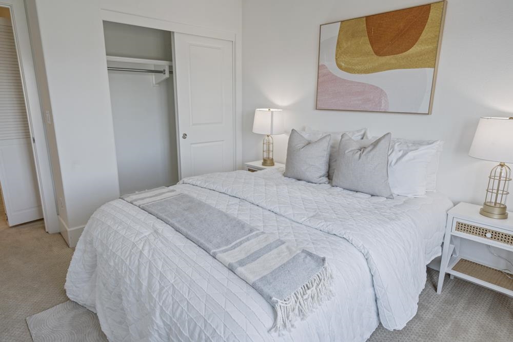 47236 Cavanaugh Common Fremont, CA 94539 - Photo 36 of 52 a bedroom with a bed and wall painting