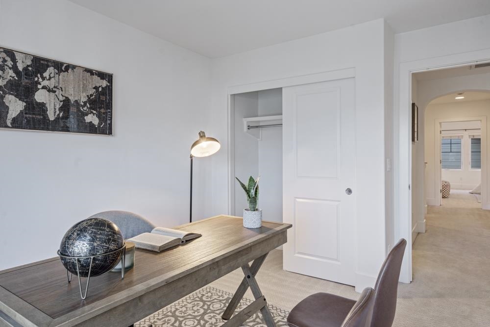 47236 Cavanaugh Common Fremont, CA 94539 - Photo 38 of 52 a workspace with furniture and wooden floor