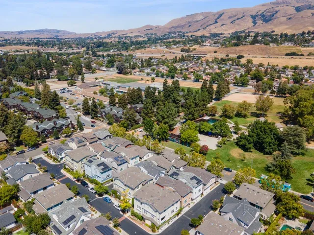 an aerial view of residential house with an outdoor space