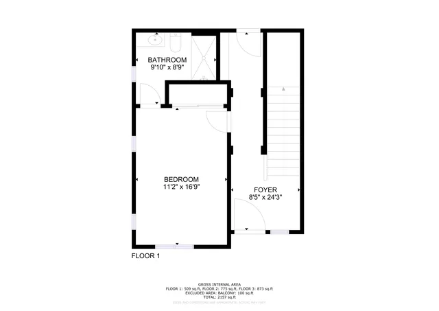 a picture of a bench in front of a wall