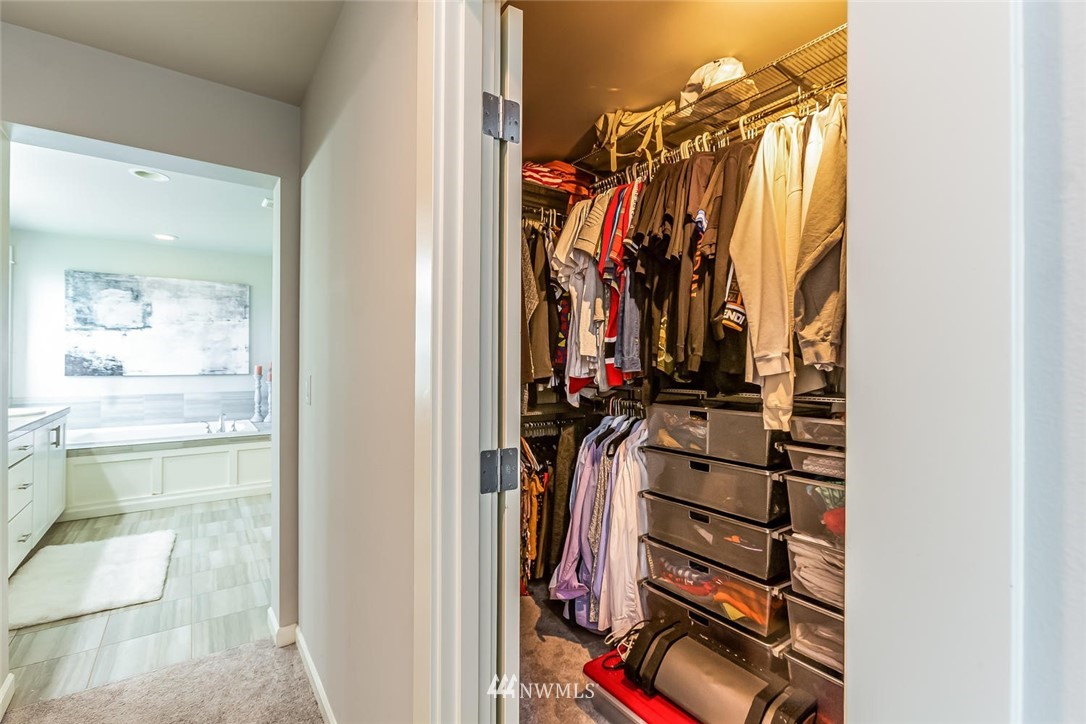5638 Northeast 9th Street Renton, WA 98059 - Photo 20 of 40 a view of walk in closet with clothes