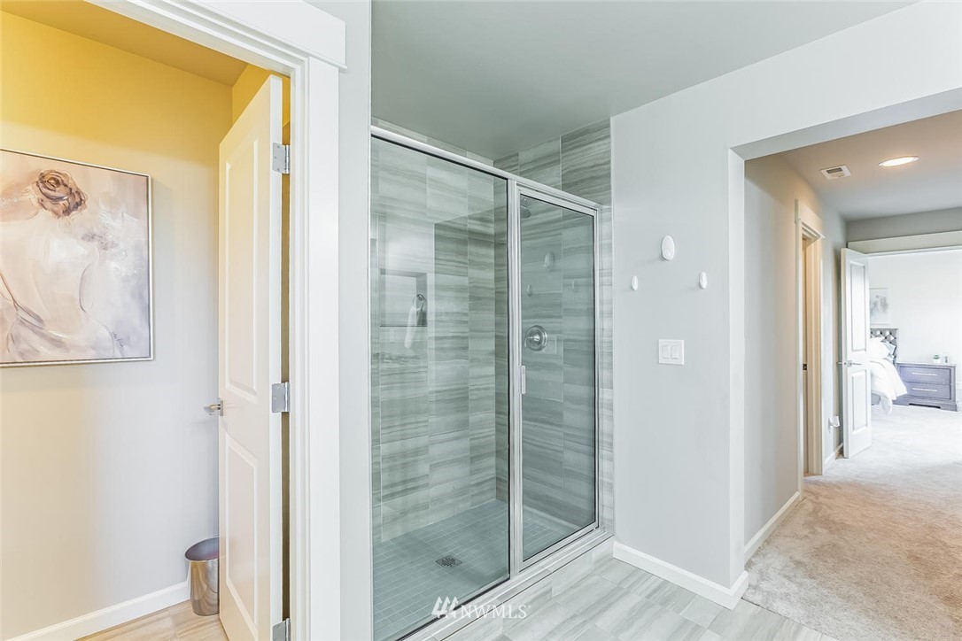 5638 Northeast 9th Street Renton, WA 98059 - Photo 23 of 40 a bathroom with a shower and a sink