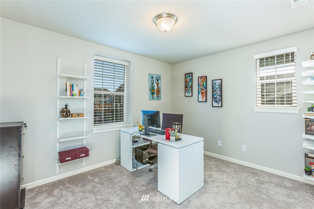 5638 Northeast 9th Street Renton, WA 98059 - Photo 28 of 40 a room with furniture and a window