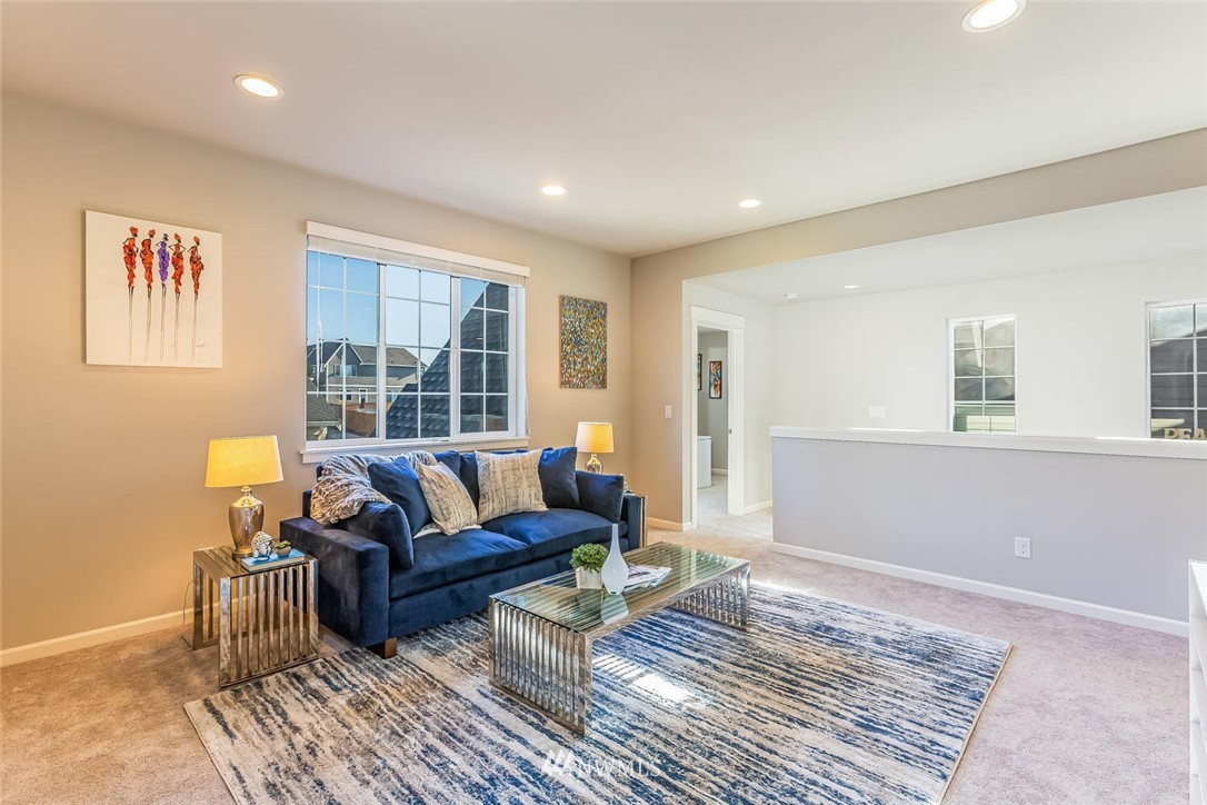 5638 Northeast 9th Street Renton, WA 98059 - Photo 31 of 40 a living room with furniture and a window