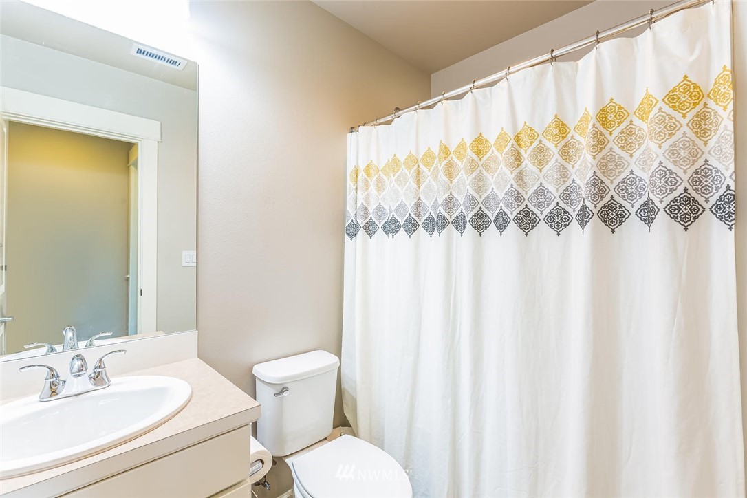 5638 Northeast 9th Street Renton, WA 98059 - Photo 35 of 40 a bathroom with a sink and a toilet