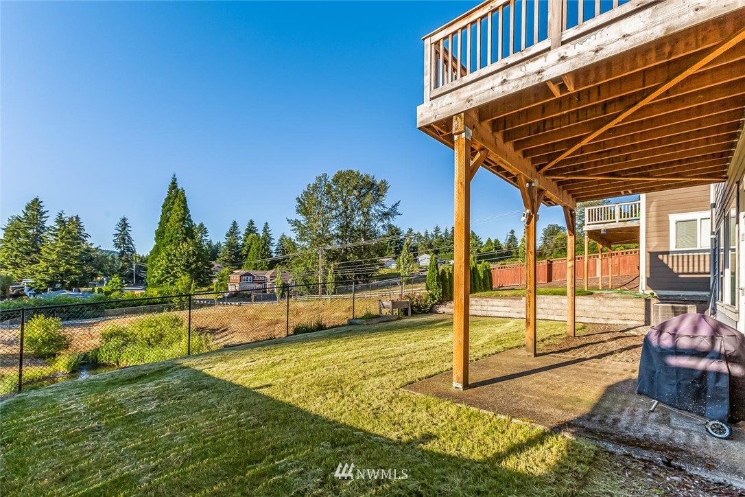 5638 Northeast 9th Street Renton, WA 98059 - Photo 38 of 40 a view of a backyard with hardwood