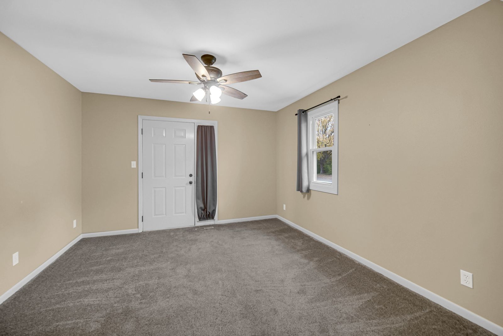 7427 McCurry Road Roscoe, IL 61073 - Photo 18 of 23 a view of an empty room with a window