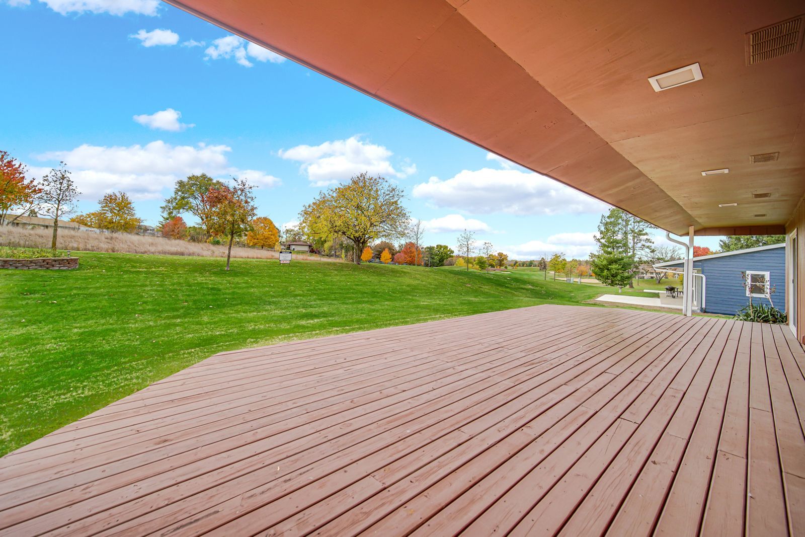 7427 McCurry Road Roscoe, IL 61073 - Photo 21 of 23 a view of a house with a yard