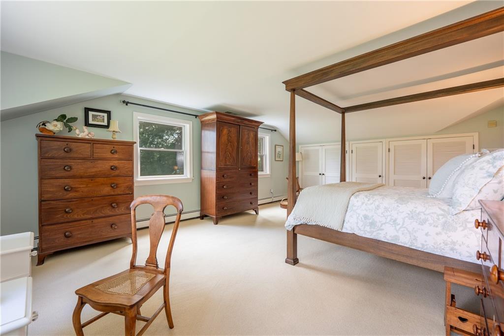 127 Mountain Road Ligonier, PA 15658 - Photo 18 of 45 a bedroom with a bed and chair