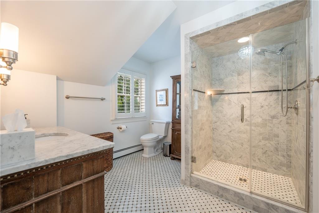 127 Mountain Road Ligonier, PA 15658 - Photo 19 of 45 a bathroom with a sink a toilet and shower