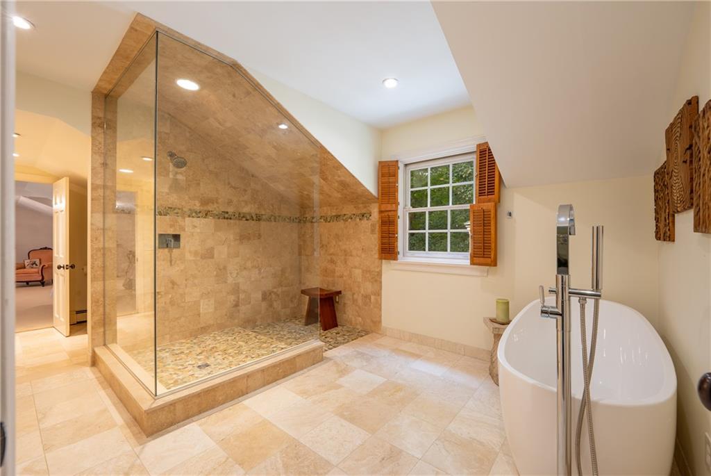 127 Mountain Road Ligonier, PA 15658 - Photo 23 of 45 a bathroom with a tub and shower