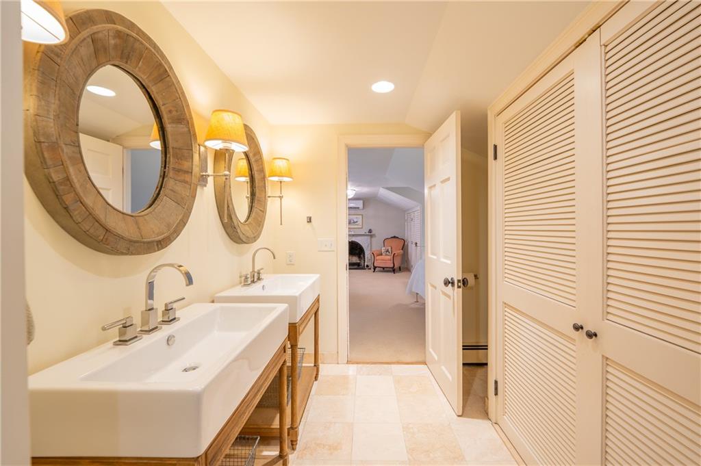 127 Mountain Road Ligonier, PA 15658 - Photo 24 of 45 a en suite bathroom with a sink and a mirror
