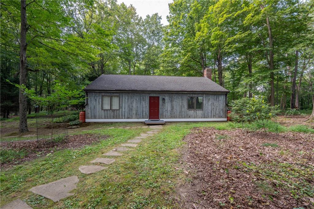 127 Mountain Road Ligonier, PA 15658 - Photo 32 of 45 a front view of a house with a garden