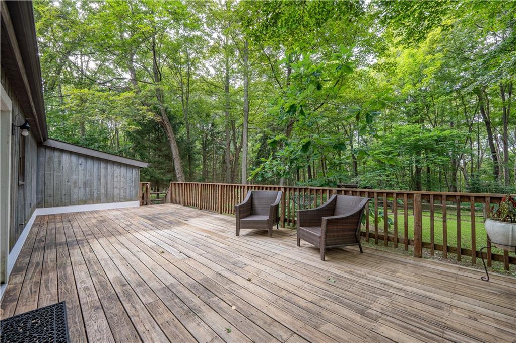 127 Mountain Road Ligonier, PA 15658 - Photo 37 of 45 a view of a wooden deck with furniture