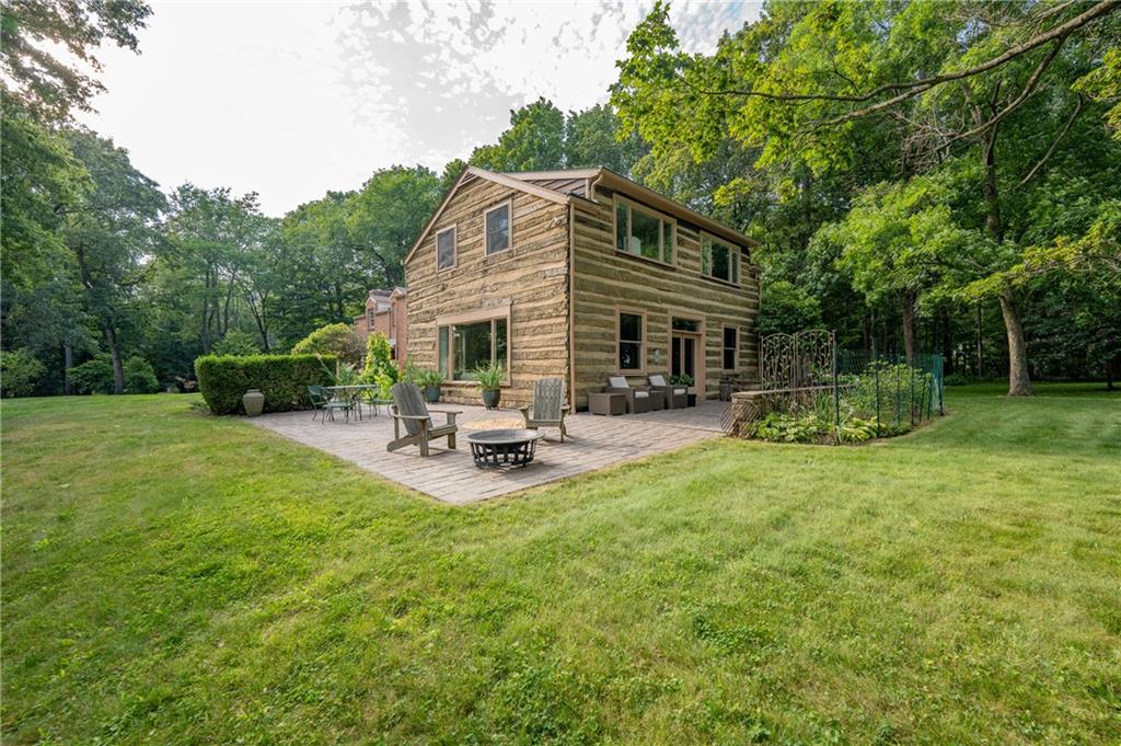 127 Mountain Road Ligonier, PA 15658 - Photo 39 of 45 a view of a house with backyard sitting area and garden