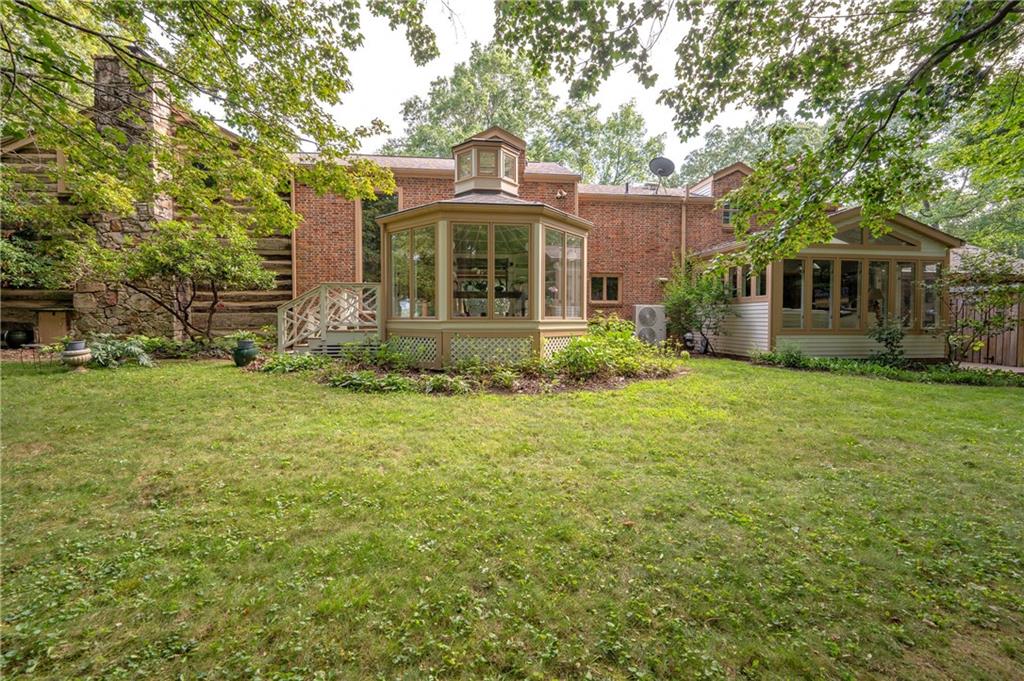 127 Mountain Road Ligonier, PA 15658 - Photo 40 of 45 a front view of a house with garden
