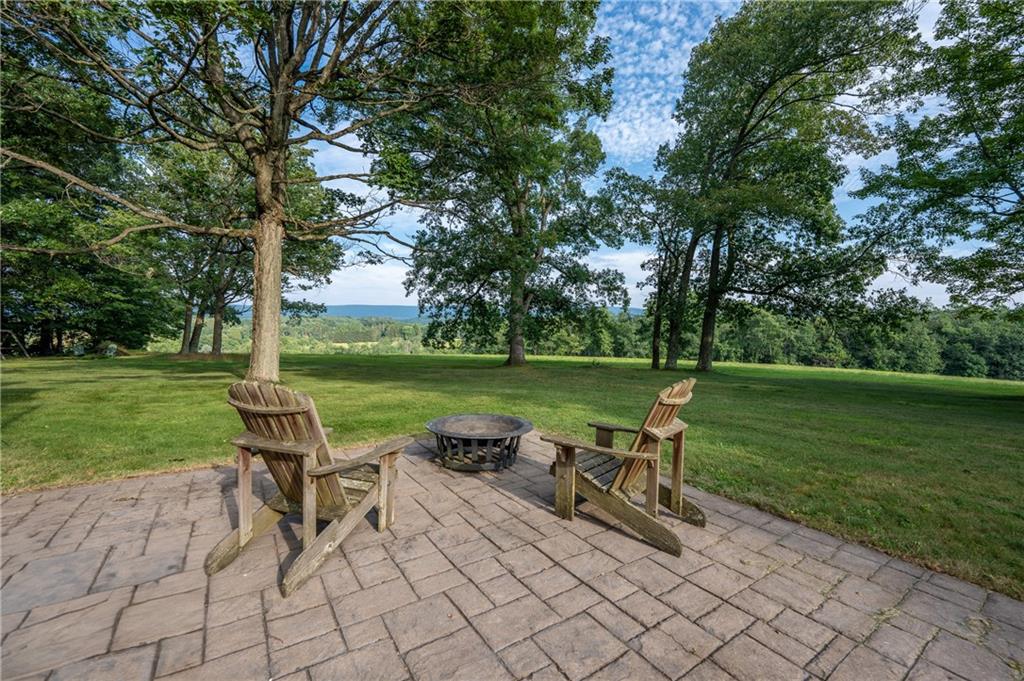127 Mountain Road Ligonier, PA 15658 - Photo 42 of 45 a view of a lake with a bench and trees