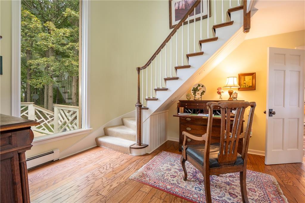 127 Mountain Road Ligonier, PA 15658 - Photo 9 of 45 a view of entryway with wooden floor and front door