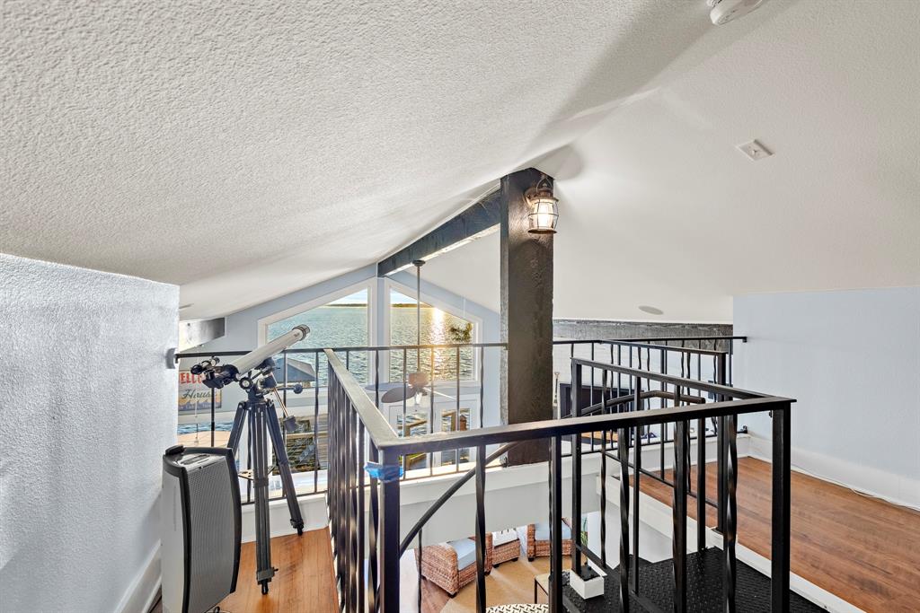 115 Isle Of View Drive Tool, TX 75143 - Photo 14 of 27 a view of staircase with railing and white walls