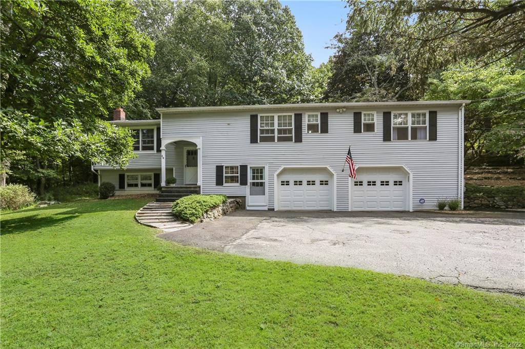 29 Scudder Road Newtown, CT 06470 - Photo 1 of 1 front view of a house with a yard