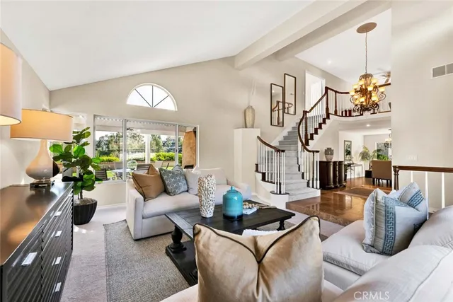 a view of a living room and entry way