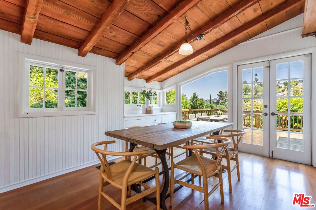 3940 Davana Road Sherman Oaks, CA 91423 - Photo 17 of 60 a view of a dining room with furniture window and outside view