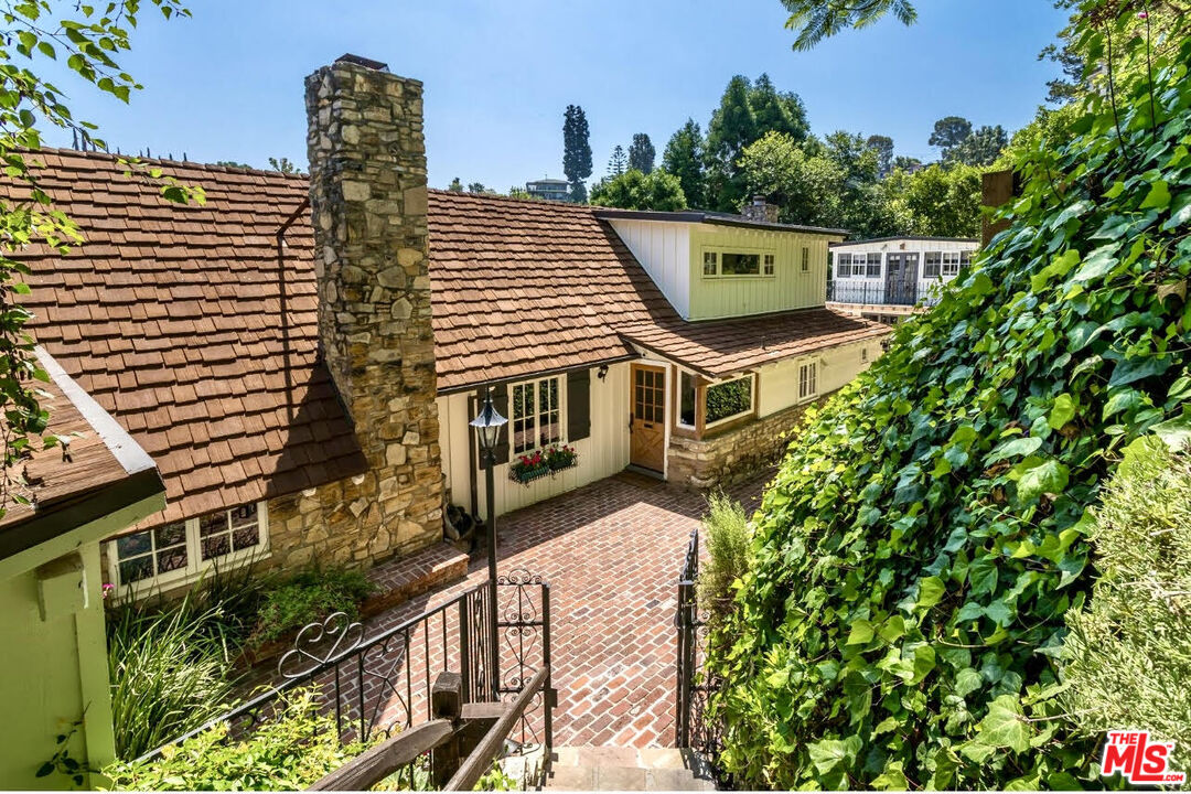 3940 Davana Road Sherman Oaks, CA 91423 - Photo 2 of 60 a front view of a house with a yard
