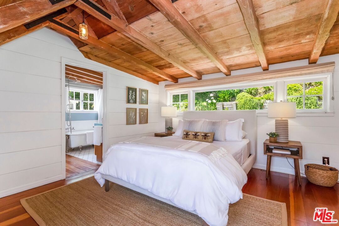 3940 Davana Road Sherman Oaks, CA 91423 - Photo 25 of 60 a bed room with a bed and a chair