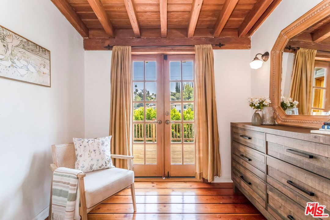 3940 Davana Road Sherman Oaks, CA 91423 - Photo 30 of 60 a living room with furniture and a window