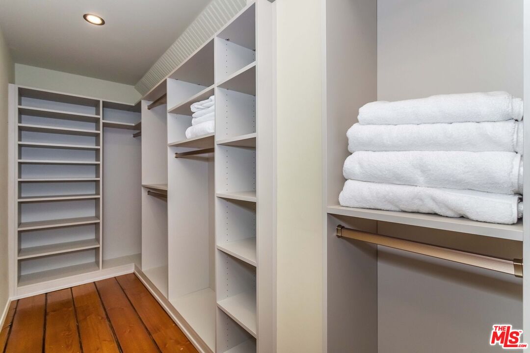 3940 Davana Road Sherman Oaks, CA 91423 - Photo 38 of 60 a view of room with walk in closet and window